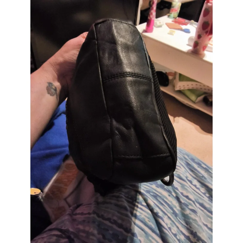 26. Coach Charles Pack Black Leather Sling Crossbody Bag F37598